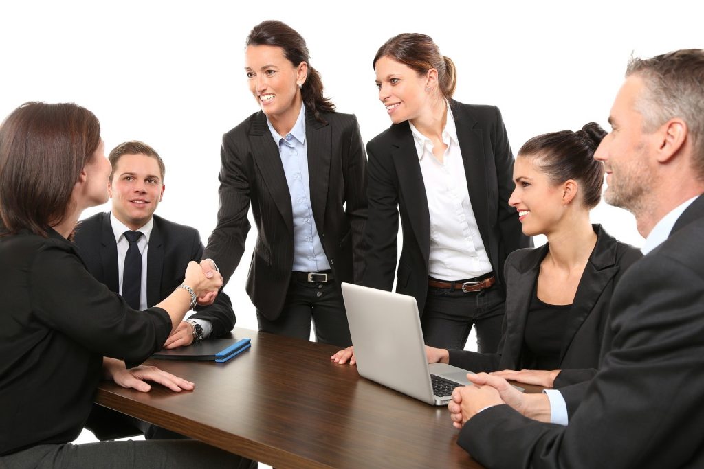 Legal professionals shaking hands