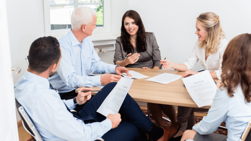 Lawyers having team meeting in law firm